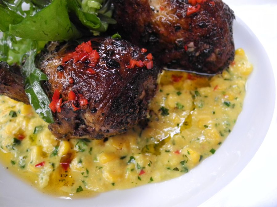 Roasted quail served with corn puree